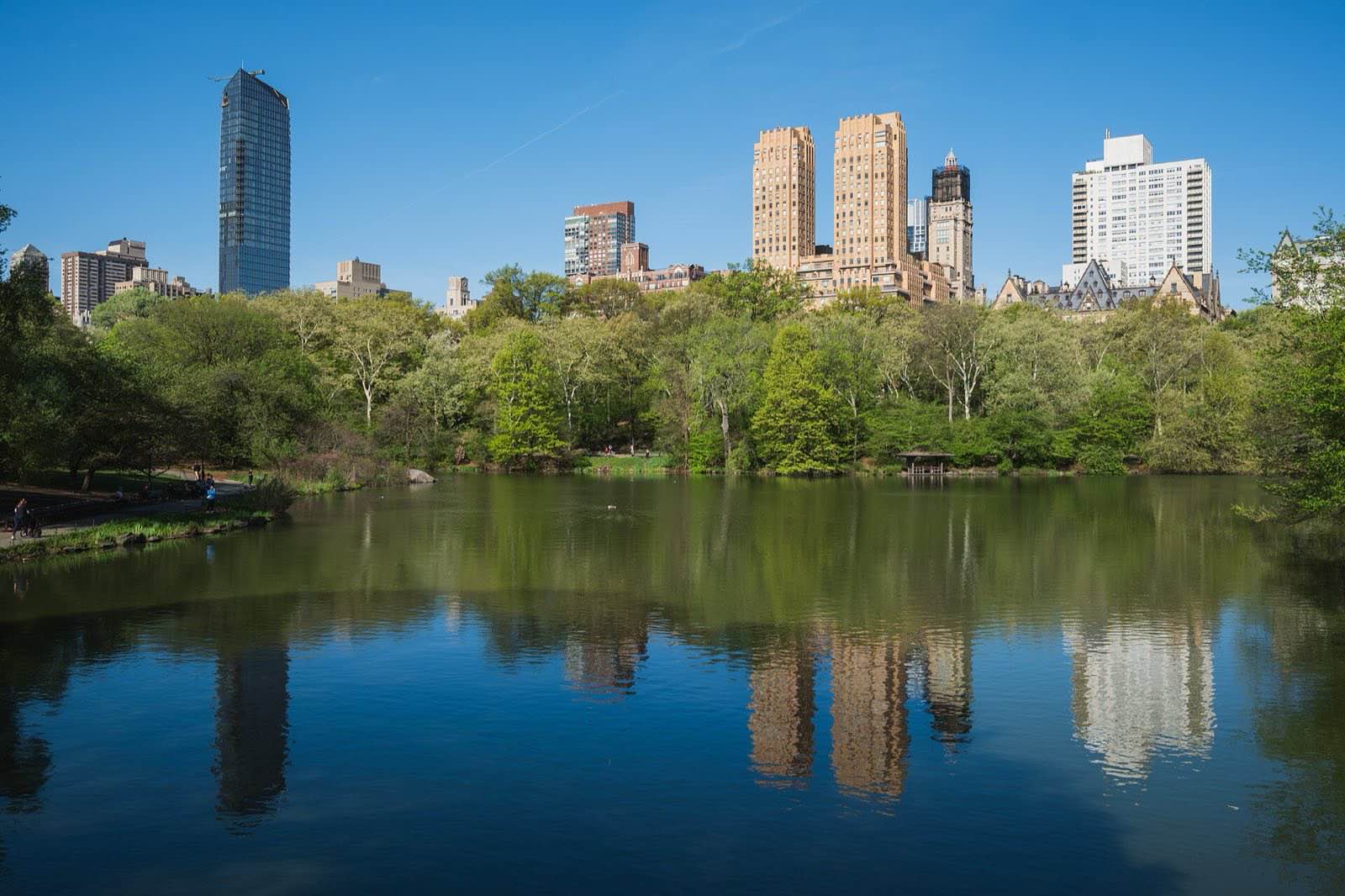 The Lake in Central Park with the reflection of the Upper West Side / Central Park West buildings, on a clear spring day