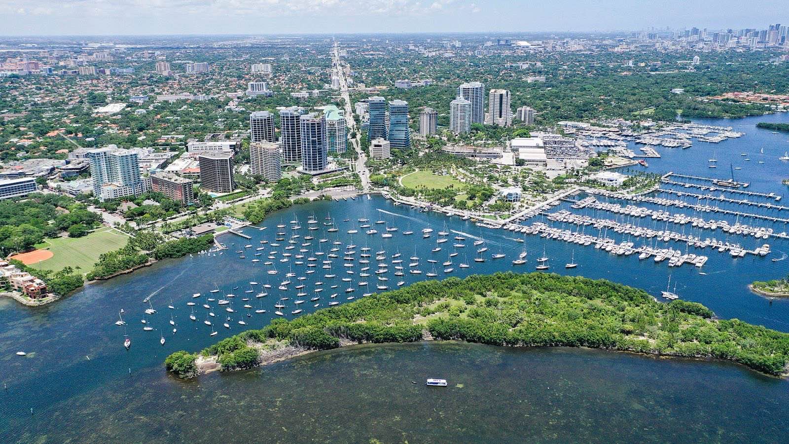 Downtown Coconut Grove in 2019, with Dinner Key in the foreground, Coral Way in the background, and Brickell to the far
