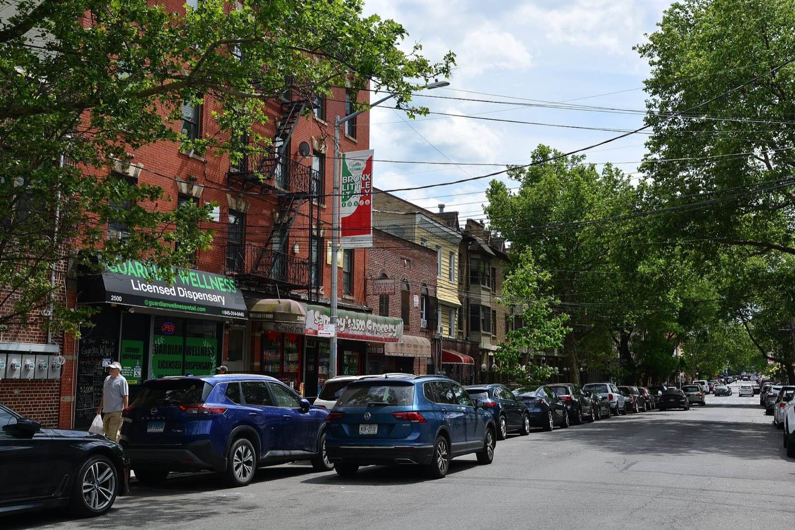 Arthur Avenue, Bronx, New York. Guardian Wellness and Sammy's 2500 Grocery.